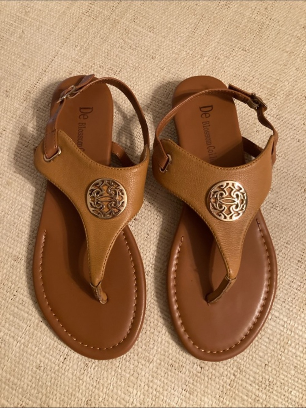 De Blossom Collection Women's Tan T-Strap Sandals with Gold Medallion